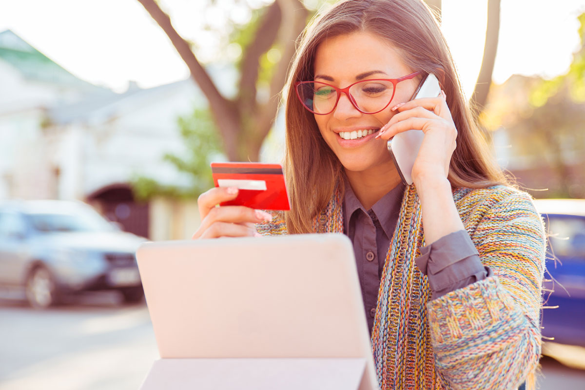 Woman using laptop to make a payment